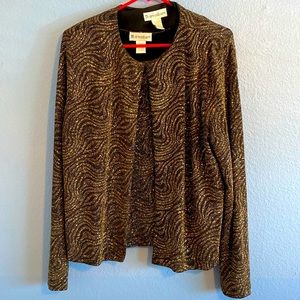 Jacket & blouse. Jacket long sleeve, padded shoulders, short sleeve blouse.